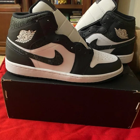 Jordan 1 Mid Black and White Athletic Shoes New never worn.